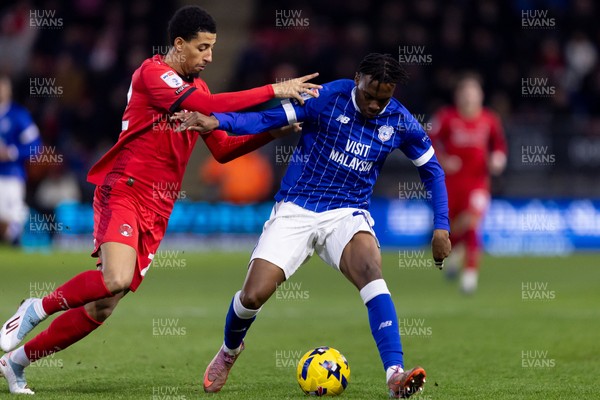 100126 - Leyton Orient v Cardiff City - Sky Bet League 1 - Ronan Kpakio of Cardiff City is challenged by Azeem Abdulai of Leyton Orient