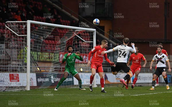 121220 - Leyton Orient v Newport County - Sky Bet League 2 - Aaron Lewis of Newport County heads over in the first half