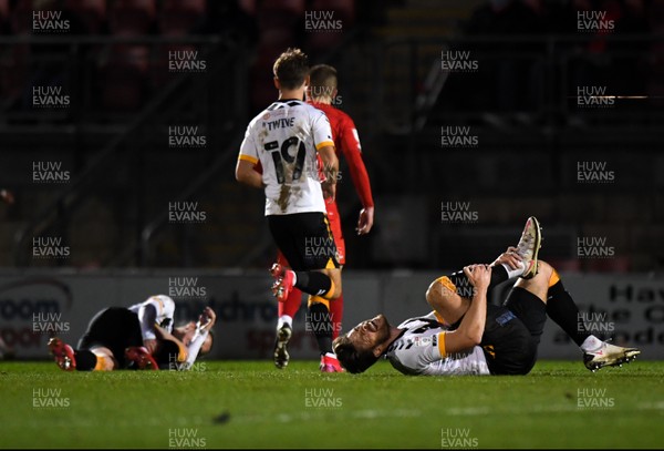 121220 - Leyton Orient v Newport County - Sky Bet League 2 - Jamie Proctor of Newport County injured in the build up to Leyton Orient's winning goal