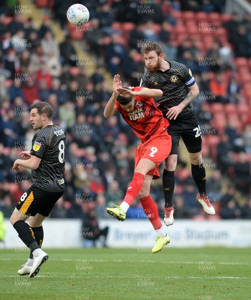 250120 - Leyton Orient v Newport County - Sky Bet League 2 -  Newport's Mark O'Brien clears from Orient's Conor Wilkinson
