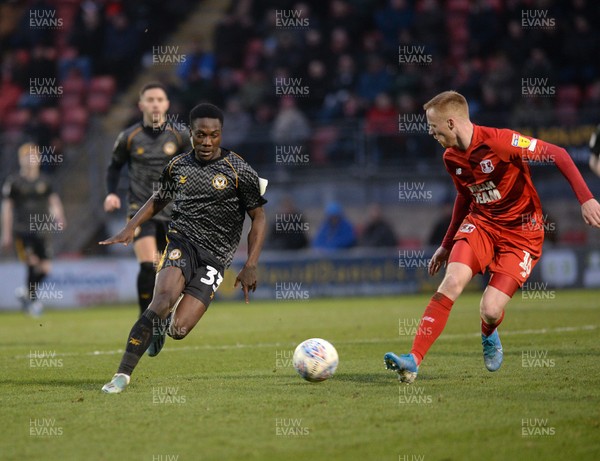 250120 - Leyton Orient v Newport County - Sky Bet League 2 -  Newport's Jordan Green runs away with the ball watched by James Brophy of Orient