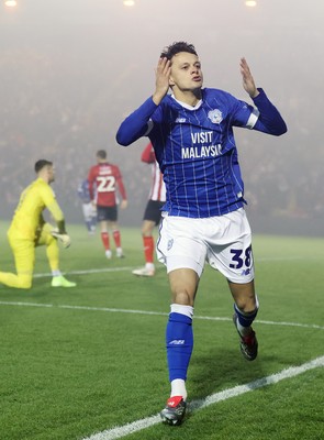 201225 - Lincoln City v Cardiff City - Sky Bet League 1 - Perry Ng of Cardiff celebrates 1st Cardiff goal in 2nd half