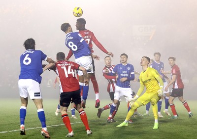 201225 - Lincoln City v Cardiff City - Sky Bet League 1 - Omari Kellyman of Cardiff tries to head in a goal