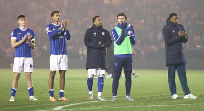 201225 - Lincoln City v Cardiff City - Sky Bet League 1 - Cardiff team applaud the travelling fans at the end of the match