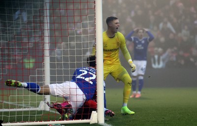 201225 - Lincoln City v Cardiff City - Sky Bet League 1 - Yousef Saleh of Cardiff nearly scores a goal but deflected by Reeco Hackett of Lincoln Saleh ends up in goalmouth