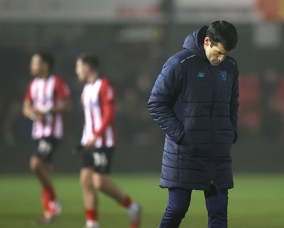 201225 - Lincoln City v Cardiff City - Sky Bet League 1 - Manager Brian Barry-Murphy of Cardiff dejected at the end of the match