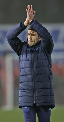 201225 - Lincoln City v Cardiff City - Sky Bet League 1 - A dejected Manager Brian Barry-Murphy of Cardiff applauds the travelling fans at the end of the match