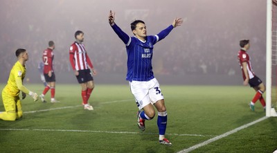 201225 - Lincoln City v Cardiff City - Sky Bet League 1 - Perry Ng of Cardiff celebrates Cardiff’s only goal