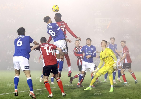 201225 - Lincoln City v Cardiff City - Sky Bet League 1 - Omari Kellyman of Cardiff tries to head in a goal