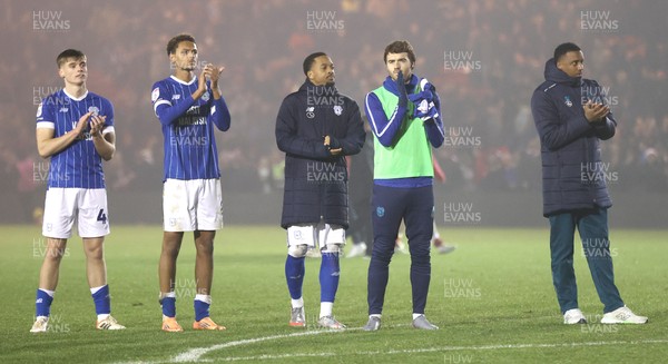 201225 - Lincoln City v Cardiff City - Sky Bet League 1 - Cardiff team applaud the travelling fans at the end of the match