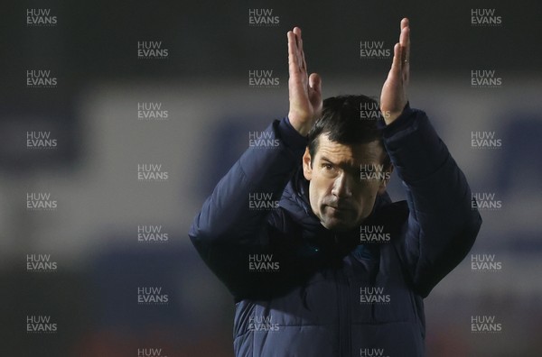 201225 - Lincoln City v Cardiff City - Sky Bet League 1 - Manager Brian Barry-Murphy of Cardiff applauds the travelling fans at the end of the match