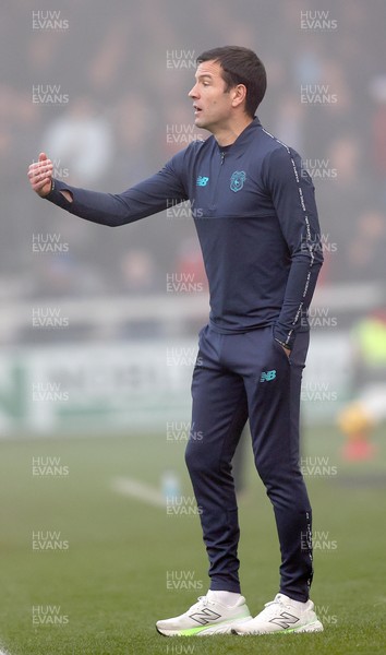 201225 - Lincoln City v Cardiff City - Sky Bet League 1 - Manager Brian Barry-Murphy of Cardiff directs his team