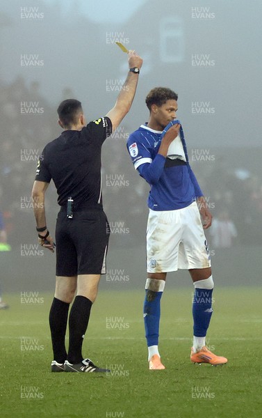 201225 - Lincoln City v Cardiff City - Sky Bet League 1 - Omari Kellyman of Cardiff gets shown a yellow card by referee Richard Eley 