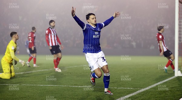 201225 - Lincoln City v Cardiff City - Sky Bet League 1 - Perry Ng of Cardiff celebrates Cardiff’s only goal