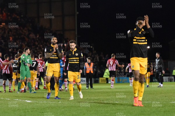 221218 - Lincoln City v Newport County - Sky Bet League 2 - Newport players applaud their fans