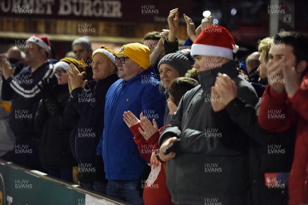 221218 - Lincoln City v Newport County - Sky Bet League 2 - Newport fans applaud their team at the end of the match