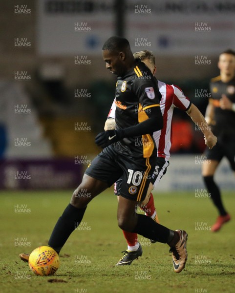 300118 - Lincoln City v Newport County, Sky Bet League 2 - Frank Nouble of Newport County gets away from Harry Anderson of Lincoln City