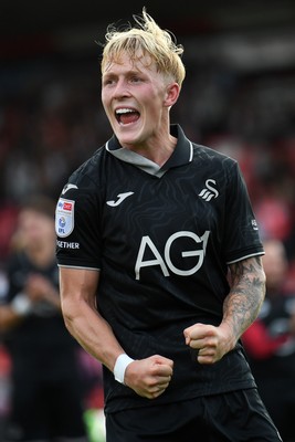 190926 - Lincoln City v Swansea City - Sky Bet Championship - Melker Widell of Swansea City celebrates the win at full time