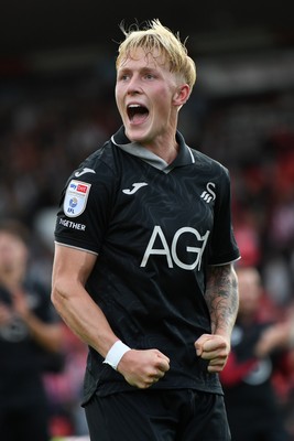 190926 - Lincoln City v Swansea City - Sky Bet Championship - Melker Widell of Swansea City celebrates the win at full time
