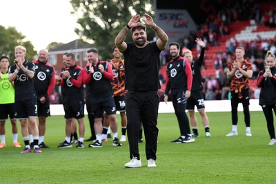 190926 - Lincoln City v Swansea City - Sky Bet Championship - Vitor Matos, Swansea Head Coach celebrates towards the Swansea supporters at full time