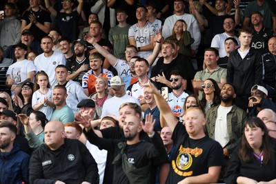 190926 - Lincoln City v Swansea City - Sky Bet Championship - Swansea fans celebrate the win at full time