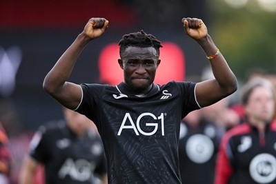 190926 - Lincoln City v Swansea City - Sky Bet Championship - Jospeh Opoku of Swansea City celebrates at full time