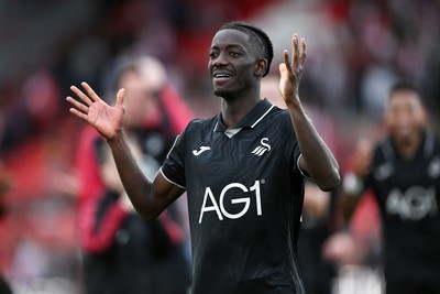 190926 - Lincoln City v Swansea City - Sky Bet Championship - Moussa Yeo of Swansea City celebrates at full time