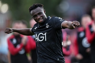 190926 - Lincoln City v Swansea City - Sky Bet Championship - Jospeh Opoku of Swansea City celebrates at full time