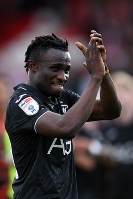 190926 - Lincoln City v Swansea City - Sky Bet Championship - Jospeh Opoku of Swansea City celebrates at full time