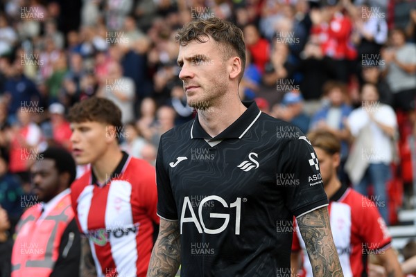 190926 - Lincoln City v Swansea City - Sky Bet Championship - Josh Tymon of Swansea City walks out at the start of the match