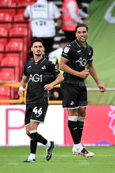 190926 - Lincoln City v Swansea City - Sky Bet Championship - Stephen Estaquio of Swansea City scores a goal to take the lead and celebrates towards the Swansea supporters