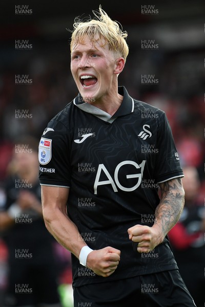190926 - Lincoln City v Swansea City - Sky Bet Championship - Melker Widell of Swansea City celebrates the win at full time