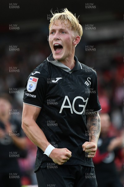 190926 - Lincoln City v Swansea City - Sky Bet Championship - Melker Widell of Swansea City celebrates the win at full time