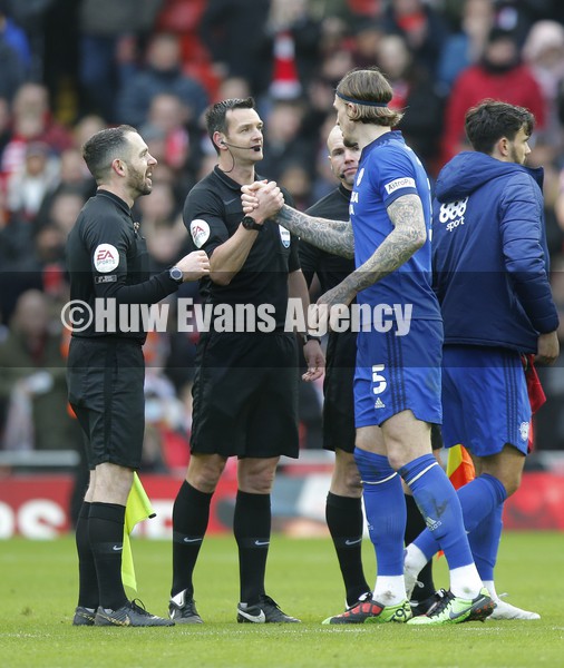 060222 - Liverpool v Cardiff City - FA Cup Fourth Round - Aden Flint of Cardiff with Referee Andrew Madely at the end of the match