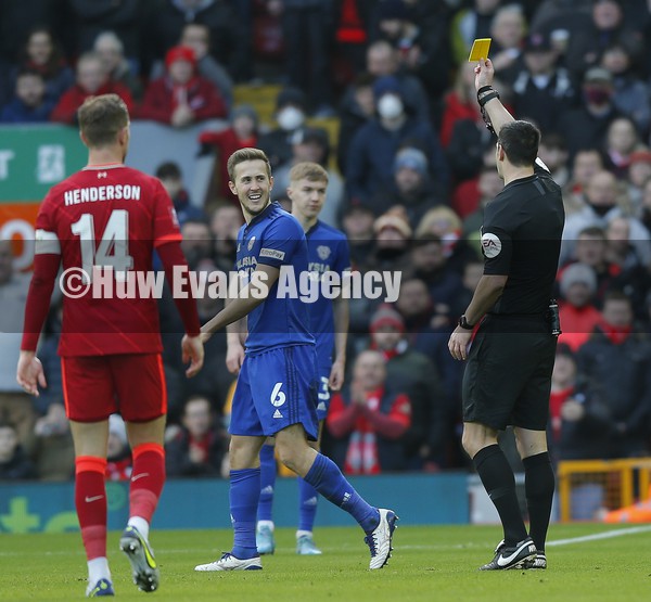 060222 - Liverpool v Cardiff City - FA Cup Fourth Round - Will Vaulks of Cardiff gets a yellow card from Referee Andy Madley
