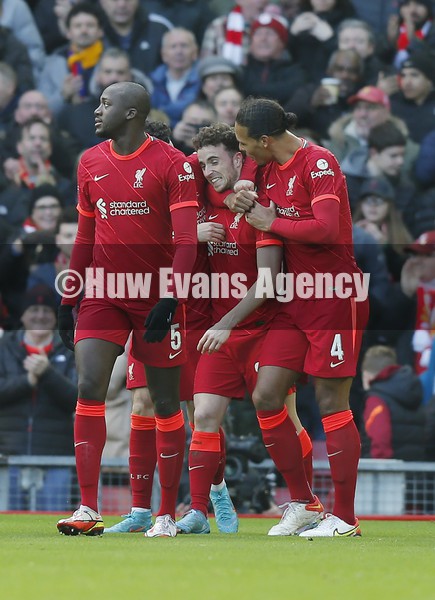 060222 - Liverpool v Cardiff City - FA Cup Fourth Round - Dioga Jota of Liverpool celebrates his goal with Virgil Van Dijk and Ibrahima Konate of Liverpool