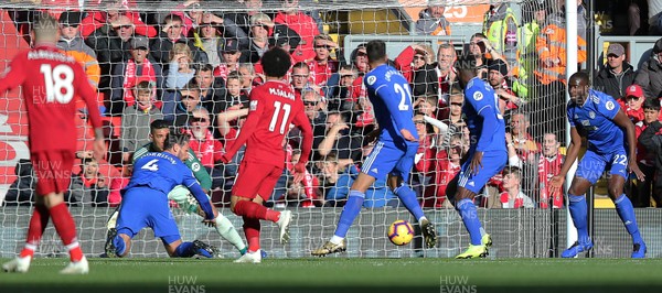 271018 - Liverpool v Cardiff - Premier League -  Bruno Ecuele Manga of Cardiff tries to defend against Sadio Mane of Liverpool and clears but confusion in the box by Sean Morrison of Cardiff