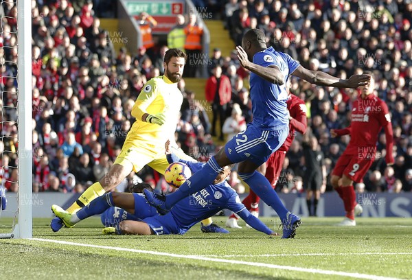 271018 - Liverpool v Cardiff - Premier League -  Sol Bamba of Cardiff and Josh Murphy of Cardiff try to score in 2nd half but goal not given