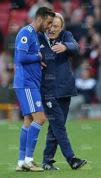 271018 - Liverpool v Cardiff - Premier League -  Manager Neil Warnock of Cardiff talks to Victor Camarasa of Cardiff at the end of the match