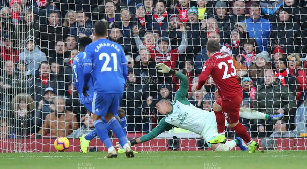271018 - Liverpool v Cardiff - Premier League -  Xherdan Shaqiri of Liverpool puts away Liverpools 3rd goal past Goalkeeper Neil Etheridge of Cardiff