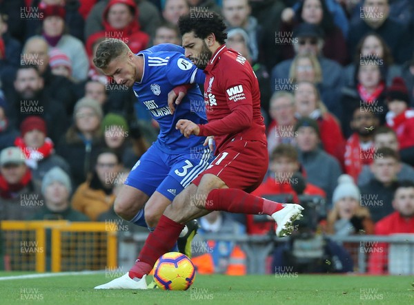 271018 - Liverpool v Cardiff - Premier League -  Joe Bennett of Cardiff tries to stop Mohamed Salah of Liverpool