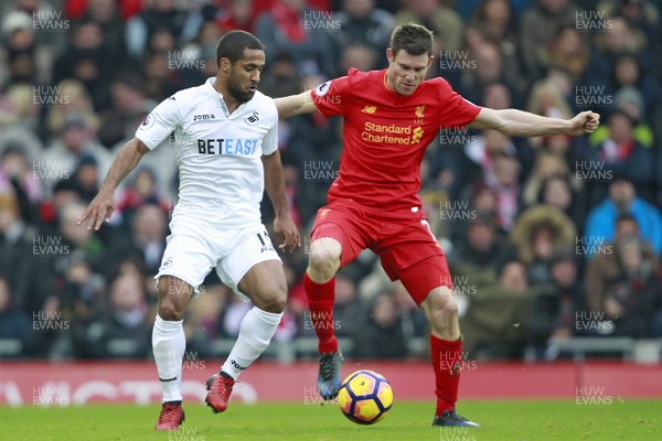 210117 - Liverpool v Swansea City, Premier League - Wayne Routledge of Swansea City (left) and James Milner of Liverpool battle for the ball by Ian Smith/Huw Evans Agency