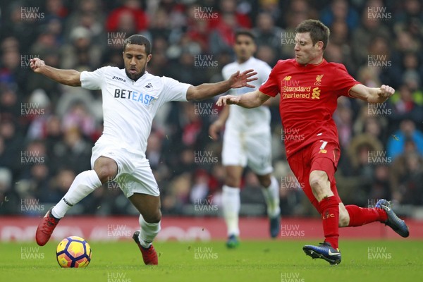 210117 - Liverpool v Swansea City, Premier League - Wayne Routledge of Swansea City (left) in action with  James Milner of Liverpool by Ian Smith/Huw Evans Agency