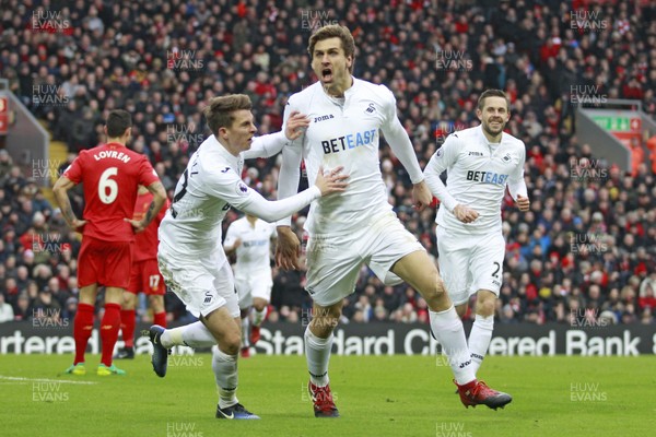 210117 - Liverpool v Swansea City, Premier League - Fernando Llorente of Swansea City (centre) celebrates scoring his side's second goal by Ian Smith/Huw Evans Agency