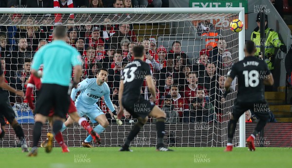 261217 - Liverpool v Swansea City - Premier League - Goalkeeper Lukasz Fabianski  of Swansea can only watch as Philippe Coutinho of Liverpool puts the ball past him for the 1st goal