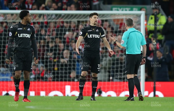 261217 - Liverpool v Swansea City - Premier League - Federico Fernandez of Swansea pleads with referee Kevin Friend to disallow goal by Liverpool