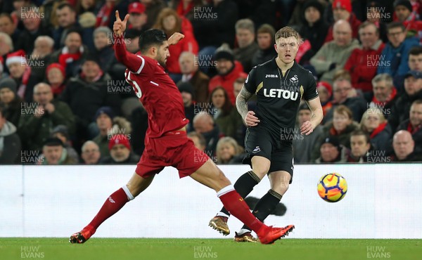 261217 - Liverpool v Swansea City - Premier League - Alex Oxlade-Chamberlain of Liverpool and Alfie Mawson of Swansea