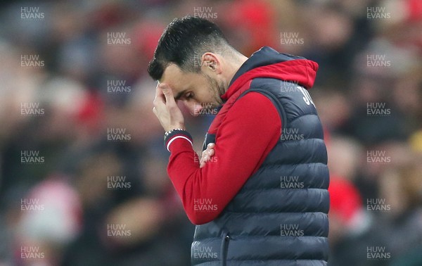 261217 - Liverpool v Swansea City - Premier League - Leon Britton of Swansea acting manager looks dejected at 4-0