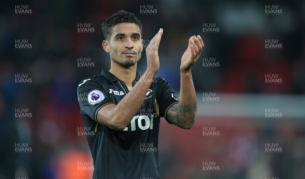 261217 - Liverpool v Swansea City - Premier League - Kyle Naughton of Swansea salutes fans at the end of the match
