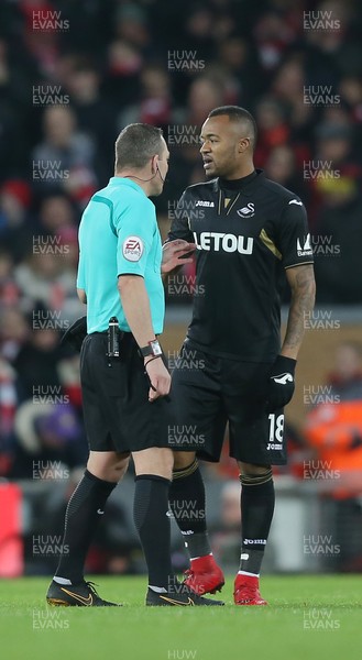 261217 - Liverpool v Swansea City - Premier League - Jordan Ayew of Swansea has words with referee Kevin Friend